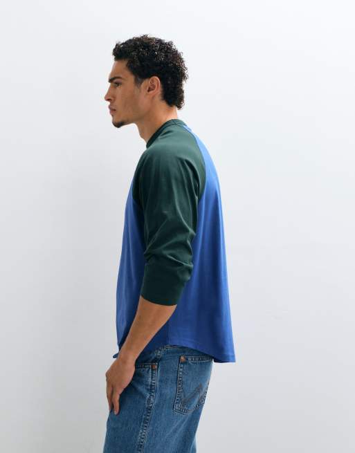ASOS DESIGN oversized long sleeve raglan t-shirt with sports print in blue, 4 of 5