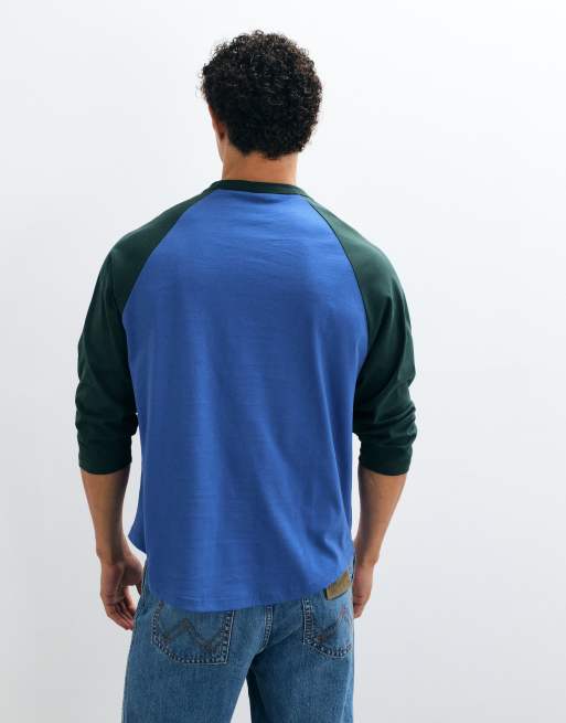 ASOS DESIGN oversized long sleeve raglan t-shirt with sports print in blue, 5 of 5