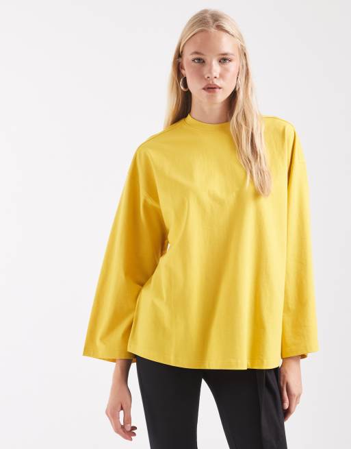 ASOS DESIGN oversized long sleeve skater t-shirt in yellow, 3 of 4