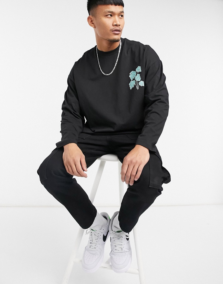 ASOS DESIGN oversized long sleeve t-shirt in black with leaf print