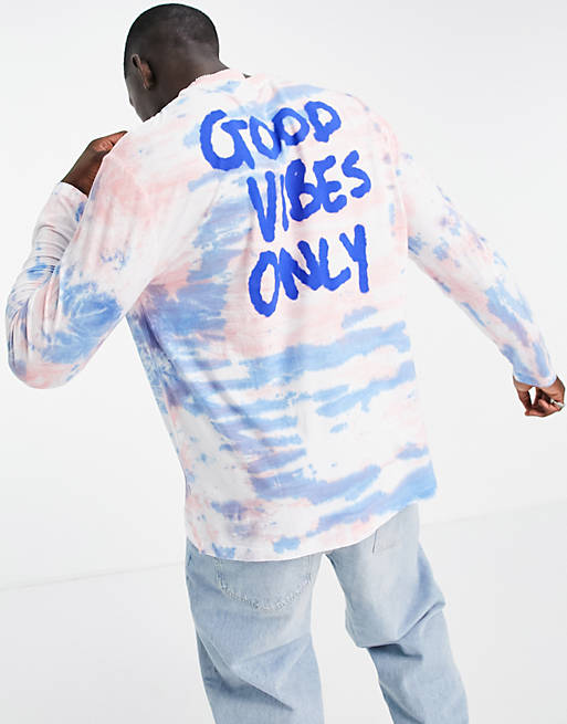 ASOS DESIGN oversized long sleeve t-shirt in tie dye with back text ...