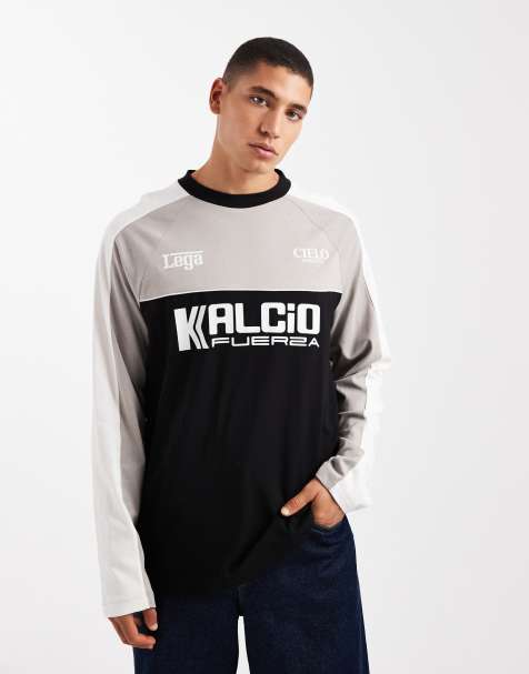 ASOS DESIGN oversized long sleeve t-shirt with cut and sew panelling and text graphic in black - view 1