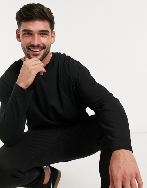 ASOS DESIGN oversized long sleeve t-shirt with raw notch neck in black