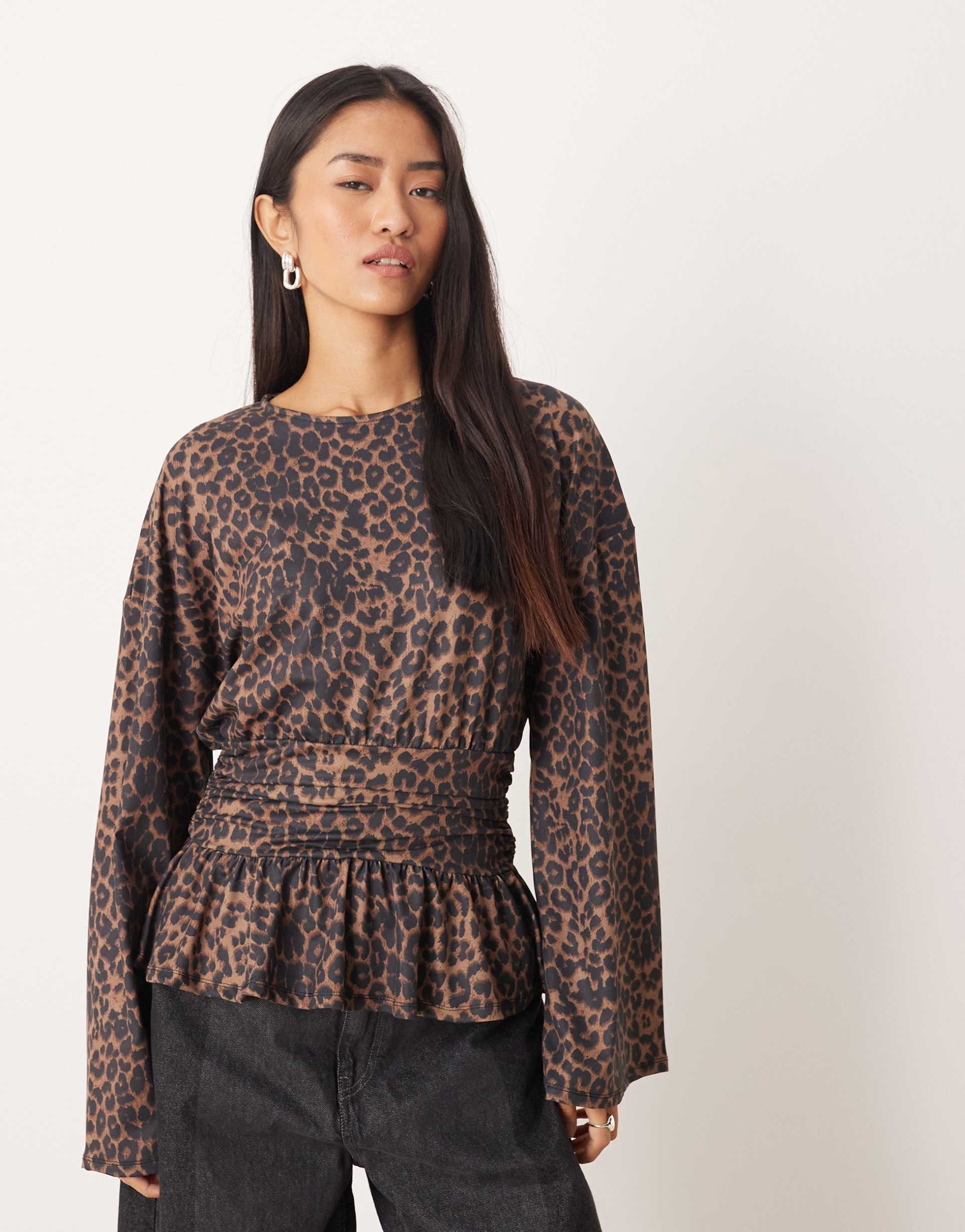 asos design oversized long sleeve tee with cinched waist and peplum hem in leopard print