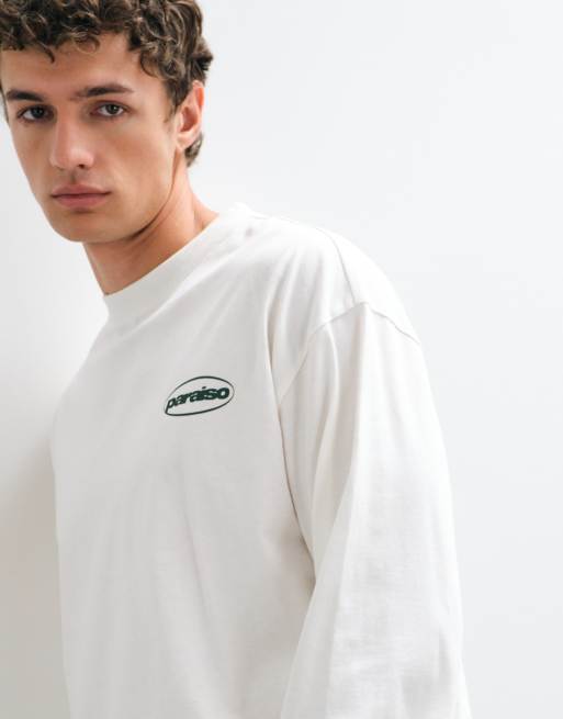 ASOS DESIGN oversized long sleeve top with badge graphic print in cream, 4 of 5