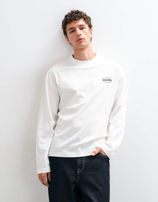 ASOS DESIGN oversized long sleeve top with badge graphic print in cream, 5 of 5