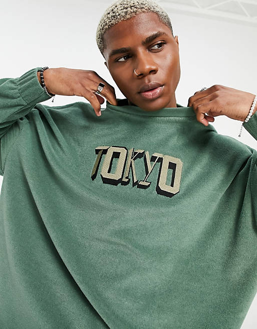 ASOS DESIGN oversized long sleeve towelling t-shirt in green with Tokyo city embroidery
