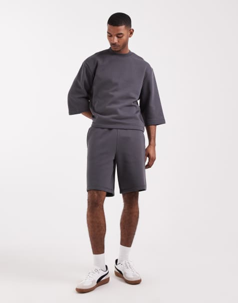 ASOS DESIGN oversized longer length jersey shorts in charcoal - part of a set - view 1