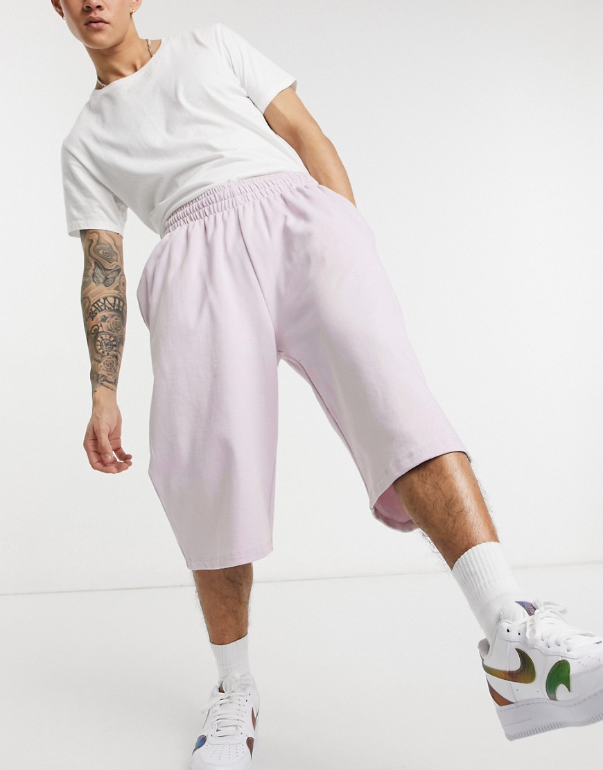 ASOS DESIGN oversized longer length jersey shorts in lilac-Purple