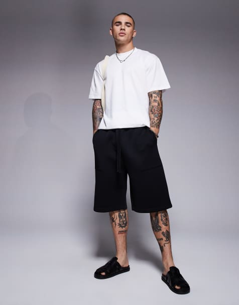 ASOS DESIGN oversized longer length scuba shorts in black - view 1