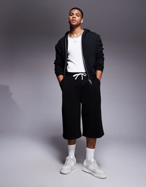 ASOS DESIGN oversized longer length short in black - view 1