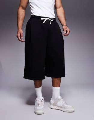 ASOS DESIGN oversized longer length shorts in black