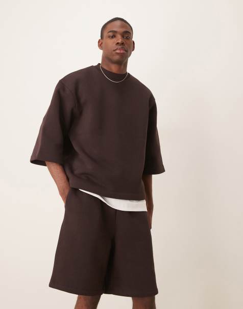 ASOS DESIGN oversized longer length shorts in brown - view 1