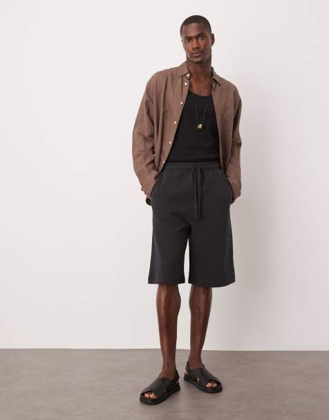 ASOS DESIGN oversized longer length textured shorts in navy - view 1