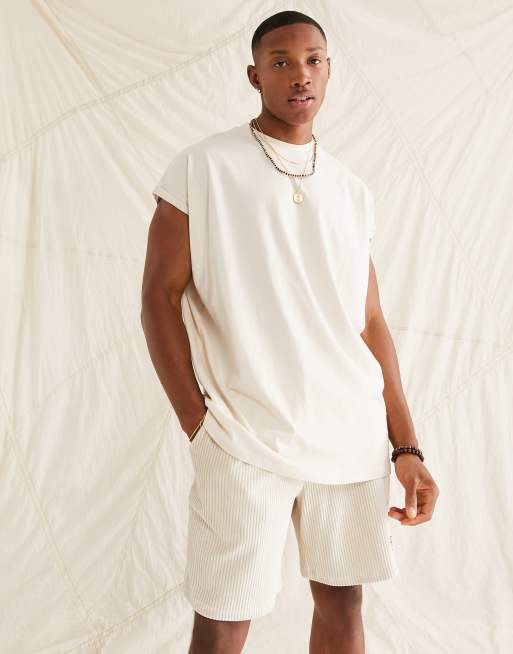 ASOS DESIGN oversized longline t-shirt with roll sleeve in beige