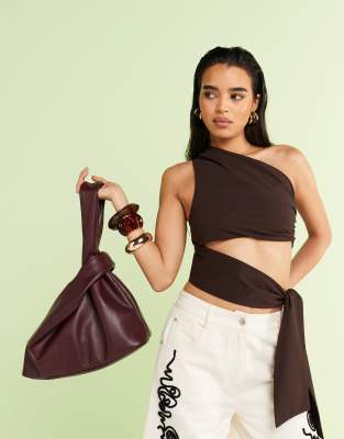 ASOS DESIGN oversized loop through clutch bag in cherry red - view 1
