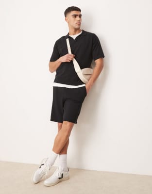 oversized midweight knitted cotton shorts in black - part of a set