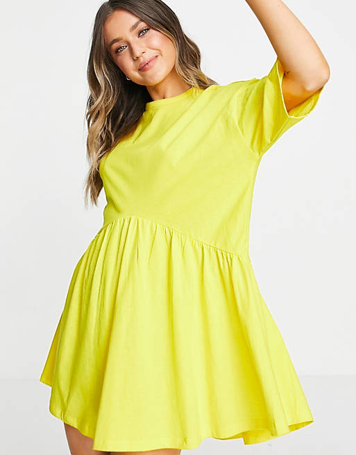 Women oversized mini smock dress with dropped waist in yellow 