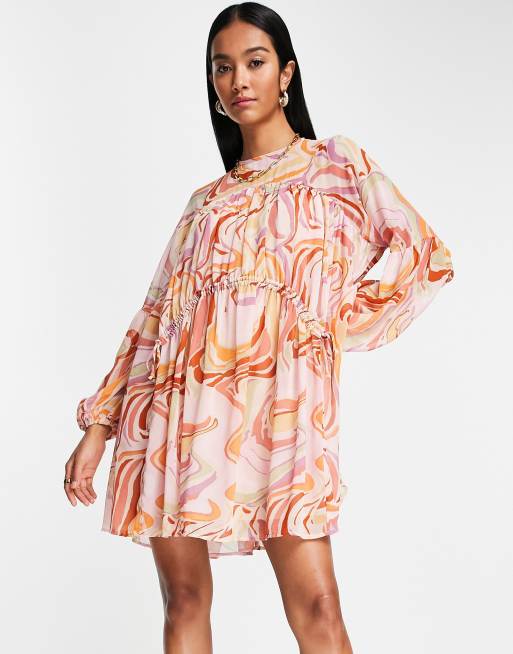 ASOS DESIGN - Oversized mini-smockjurk met aangerimpelde taille en felgekleurde wervelprint