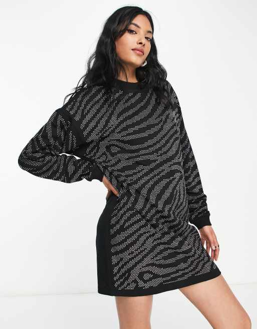 ASOS DESIGN oversized mini sweats dress with silver tiger embellishment in black