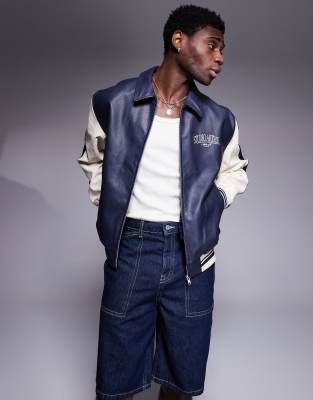ASOS DESIGN - Oversized motocrossjack van imitatieleer in marineblauw met contrasterende mouwen - view 1