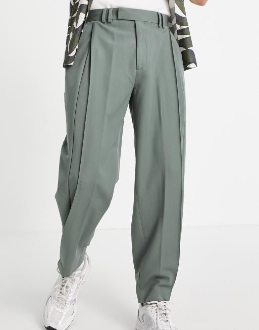 ASOS DESIGN - Oversized nette broek met plooien en toelopende pijpen in groen