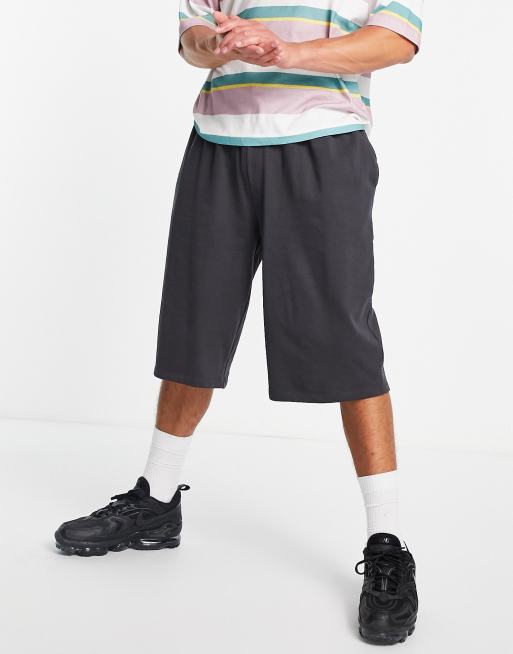 ASOS DESIGN - Oversized og lange jerseyshorts i forvasket sort