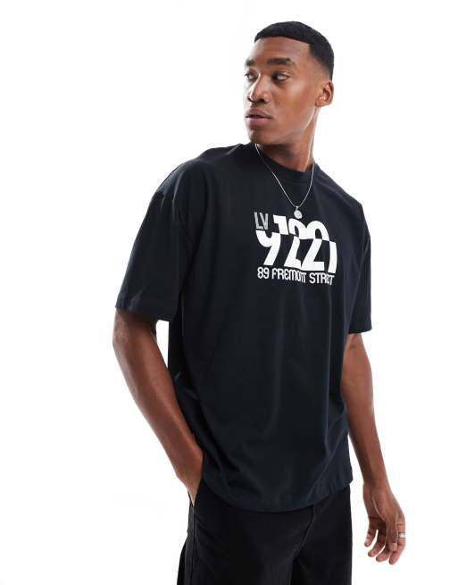 ASOS DESIGN - Oversized og sort T-shirt med tekst-print på brystet