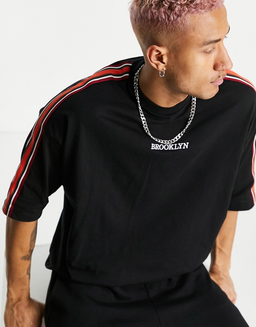 ASOS DESIGN oversized organic t-shirt in black with taping and Brooklyn embroidery