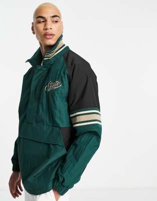 ASOS DESIGN oversized overhead rain jacket in green with vintage print