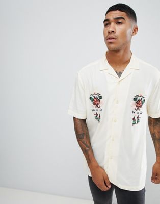 ASOS DESIGN - Oversized overhemd met reverskraag en borduursel-Beige