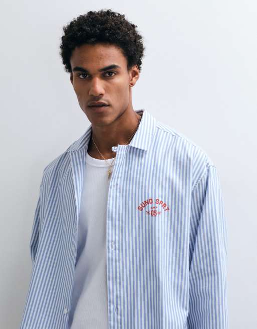 ASOS DESIGN oversized Oxford overhemd met streep, print op rug en borst in blauw, 2 van 5