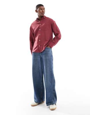 ASOS DESIGN oversized oxford shirt in burgundy.