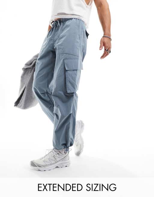 ASOS DESIGN oversized parachute crinkle cargo pants in blue