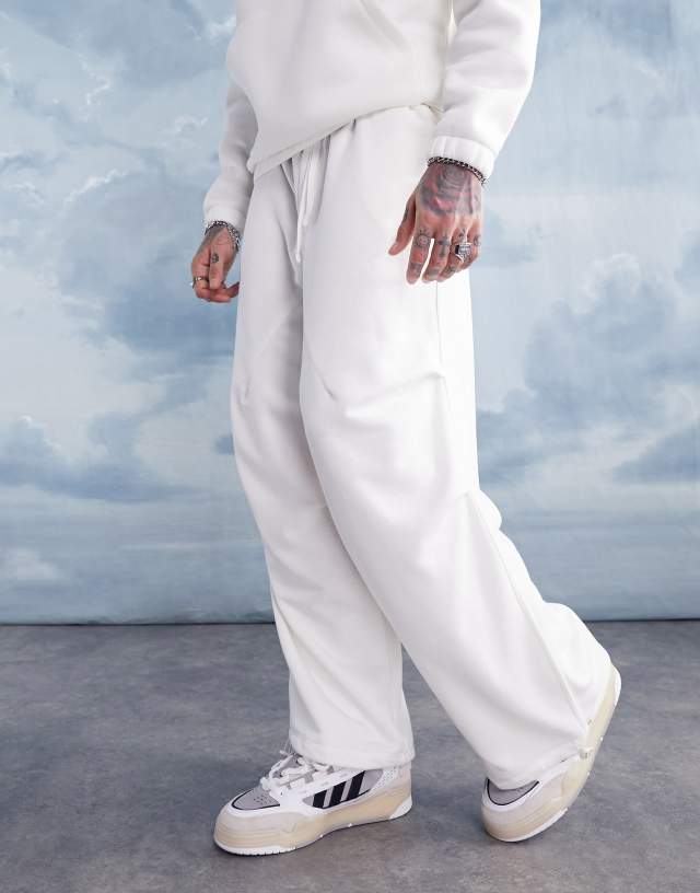 ASOS DESIGN oversized parachute sweatpants in off white