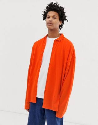 ASOS DESIGN - Oversized pique overhemd in oranje