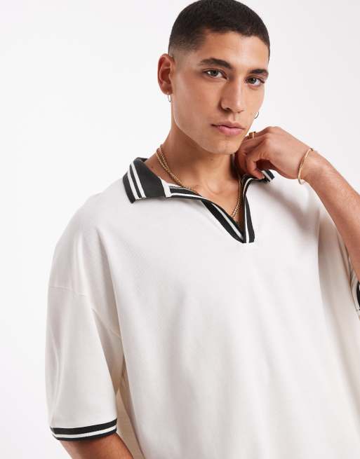 ASOS DESIGN oversized pique polo with contrast collar and hem detail in cream