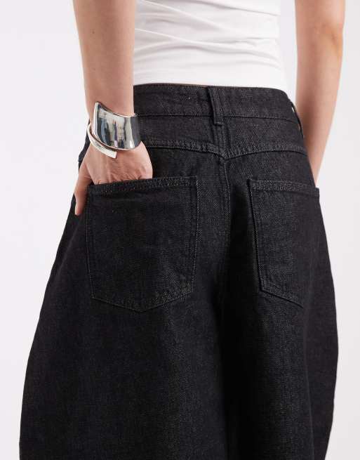 ASOS DESIGN oversized pleat Bermuda shorts in black rinse, 4 of 5