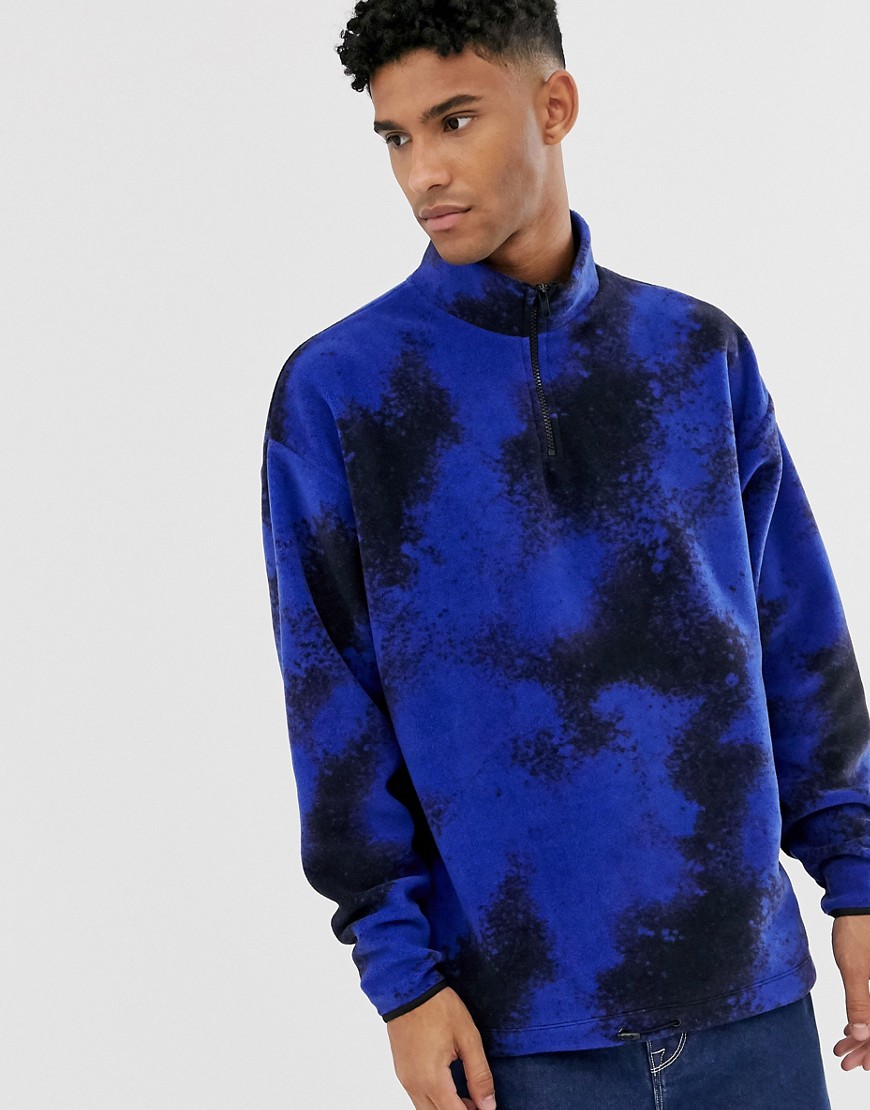 ASOS DESIGN oversized polar fleece sweatshirt with half zip in spray print-Blue