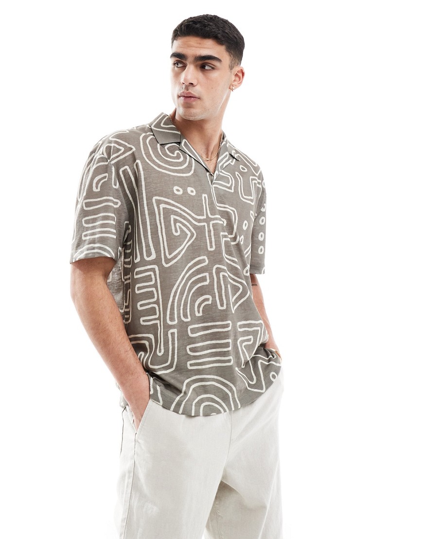 oversized polo in all over print with camp collar-Green