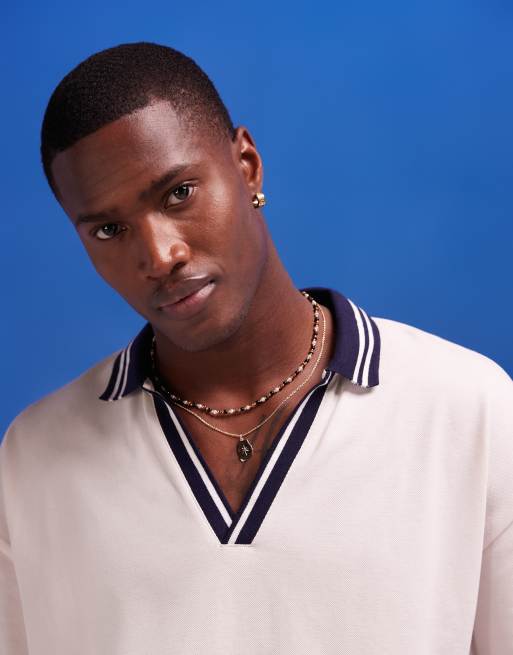 ASOS DESIGN oversized polo shirt in beige with blue revere collar, 3 of 4