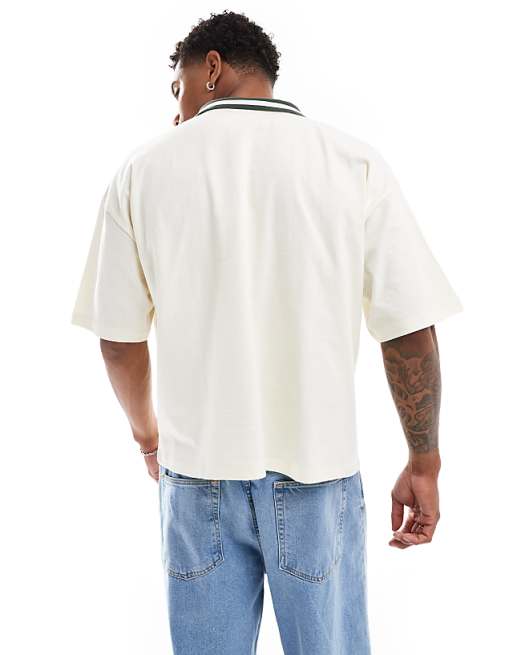 ASOS DESIGN oversized polo shirt in off white with paraiso ASOS DESIGN oversized polo shirt in off white with paraiso