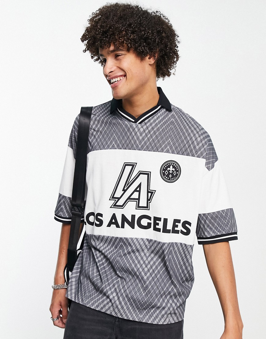 ASOS DESIGN oversized polo T-shirt in retro football print in black & white