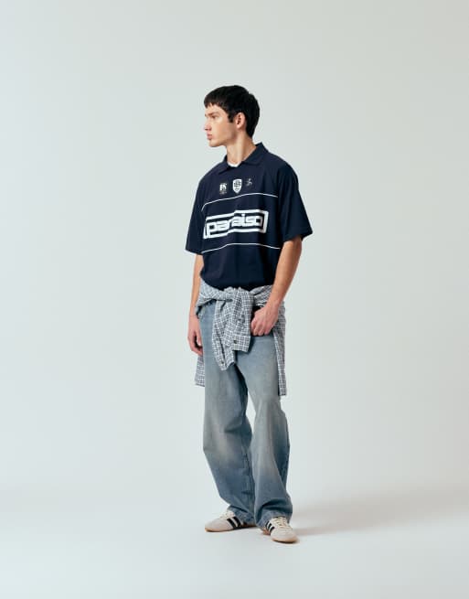 ASOS DESIGN oversized polo t-shirt with panels and paraiso graphic in navy, 2 of 5