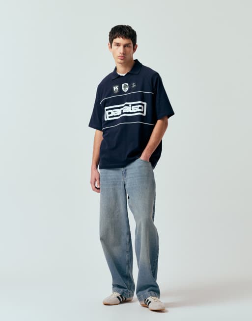 ASOS DESIGN oversized polo t-shirt with panels and paraiso graphic in navy, 4 of 5