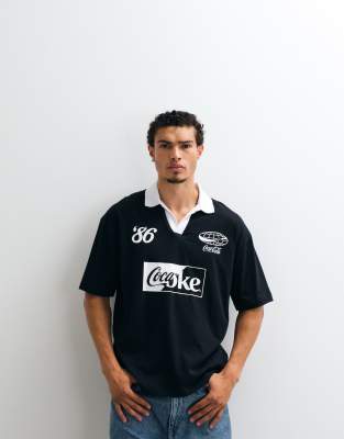 Asos Design Oversized Polo With Coca Cola Print In Black