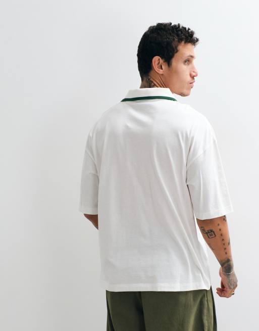 ASOS DESIGN oversized polo with Coca Cola Print in White, 2 of 5