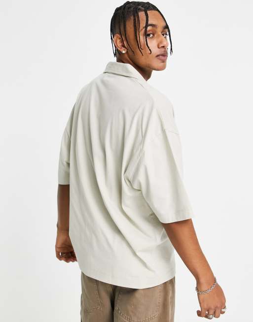 ASOS DESIGN Curve oversized polo T-shirt in brown