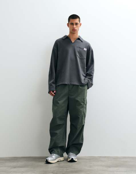 ASOS DESIGN oversized polo with notch neck and woven tab in charcoal - view 1