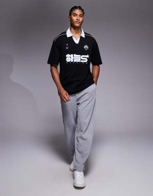 Asos Design Oversized Polo With Piping Detail And Sports Graphic In Black